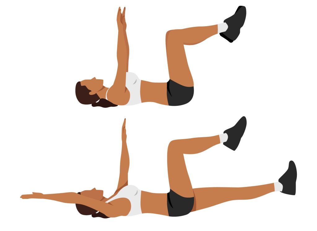 Woman doing dead bug exercises for abdominal strengthening