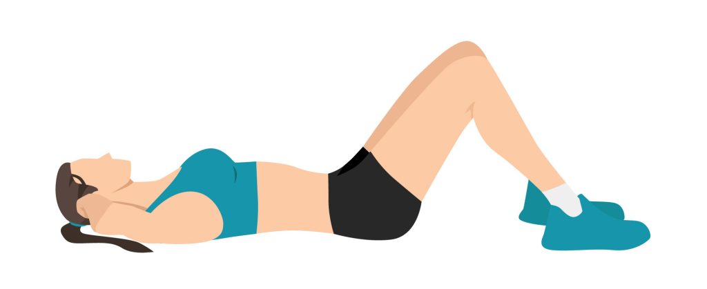 Woman lying down doing transversus abdomins activation