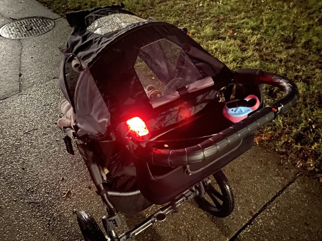 bike light attached to jogging stroller handlebar