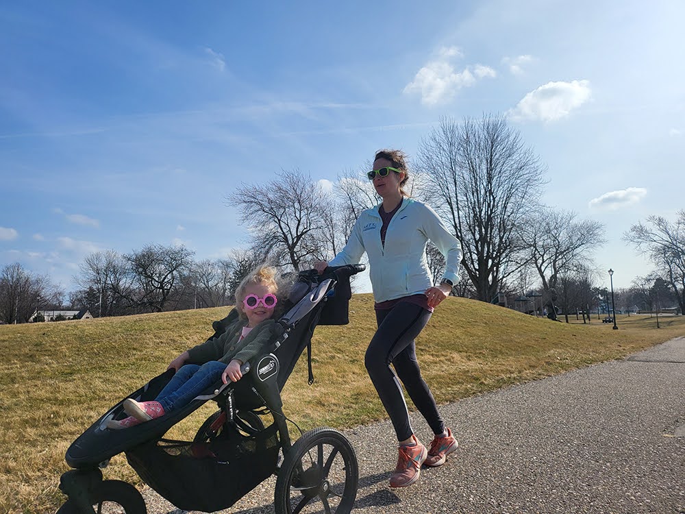Bri Terry running intervals with her daughter in Summit Jogging Stroller