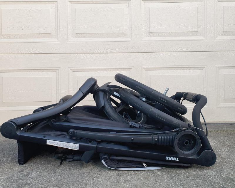 Folded Thule Urban Glide Stroller for transport
