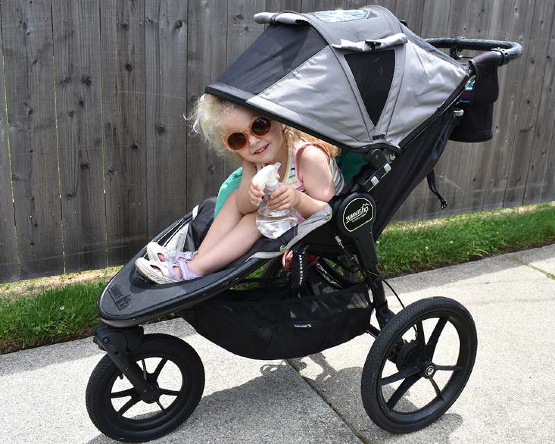 Keeping baby cool in the stroller with a sun canopy