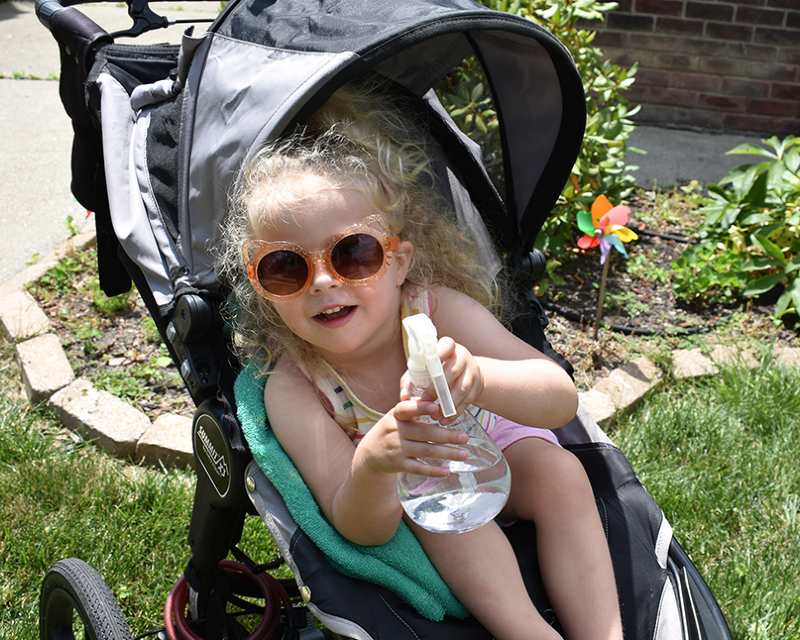 A spray bottle and damp towel will keep baby cool in the summer
