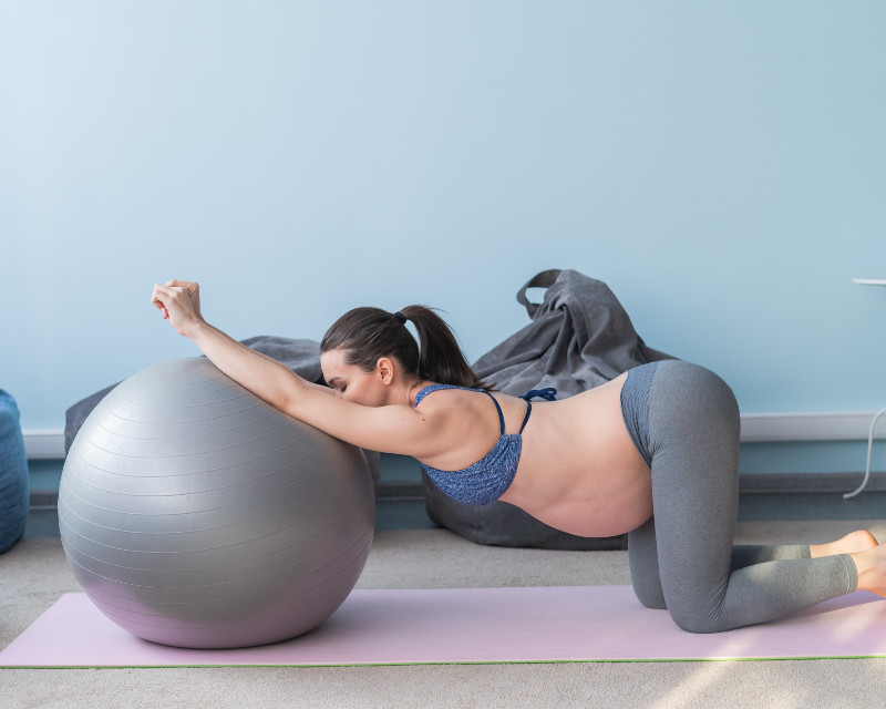 Open up your hips with postpartum stretches