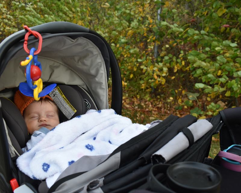 Accessories like a pacifier will make any run with a newborn much more pleasant for your baby