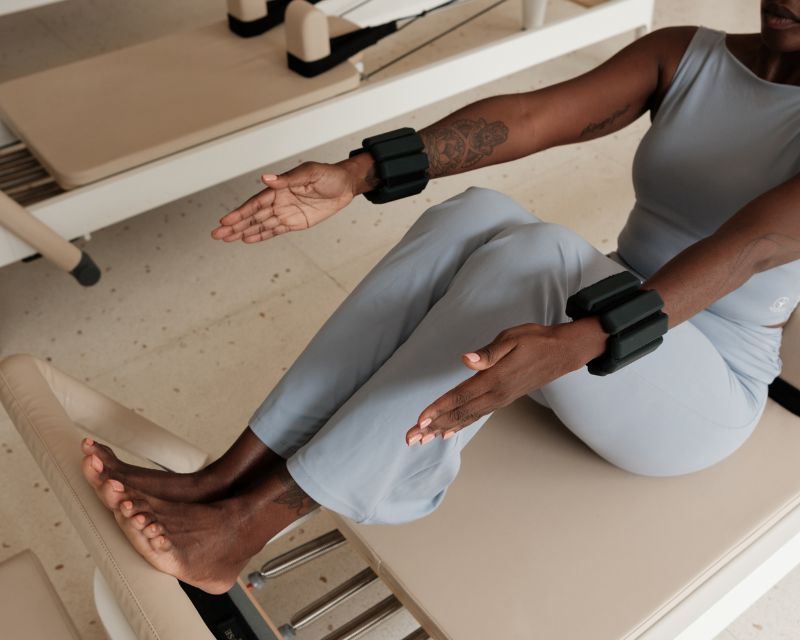 Core exercises integrated into postpartum Pilates programs