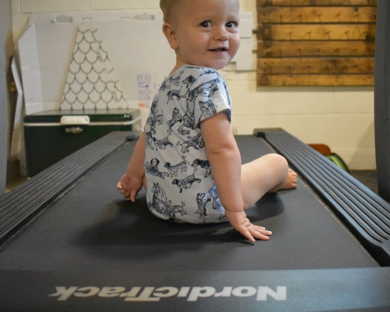 Happy baby after mom finishes her treadmill workouts