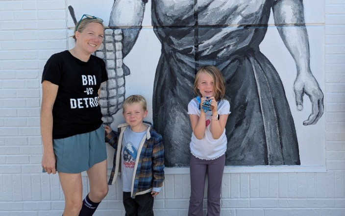 MC Covington wearing running mantras shirt